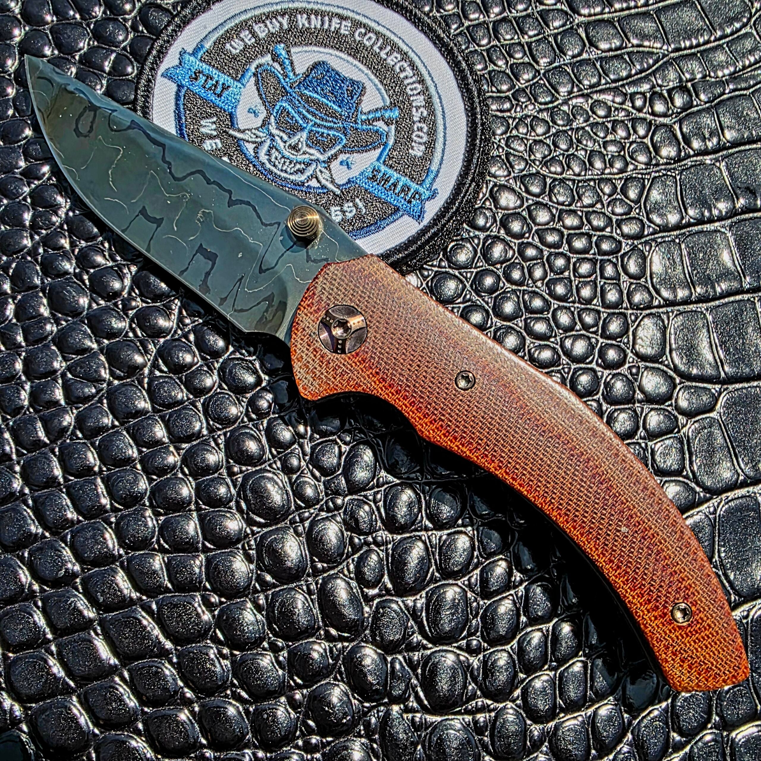 Melvin Lozada Saber Cub 3.0 Prototype #2 with Hot Blued Brad Vice Damascus and Vintage Brown Micarta