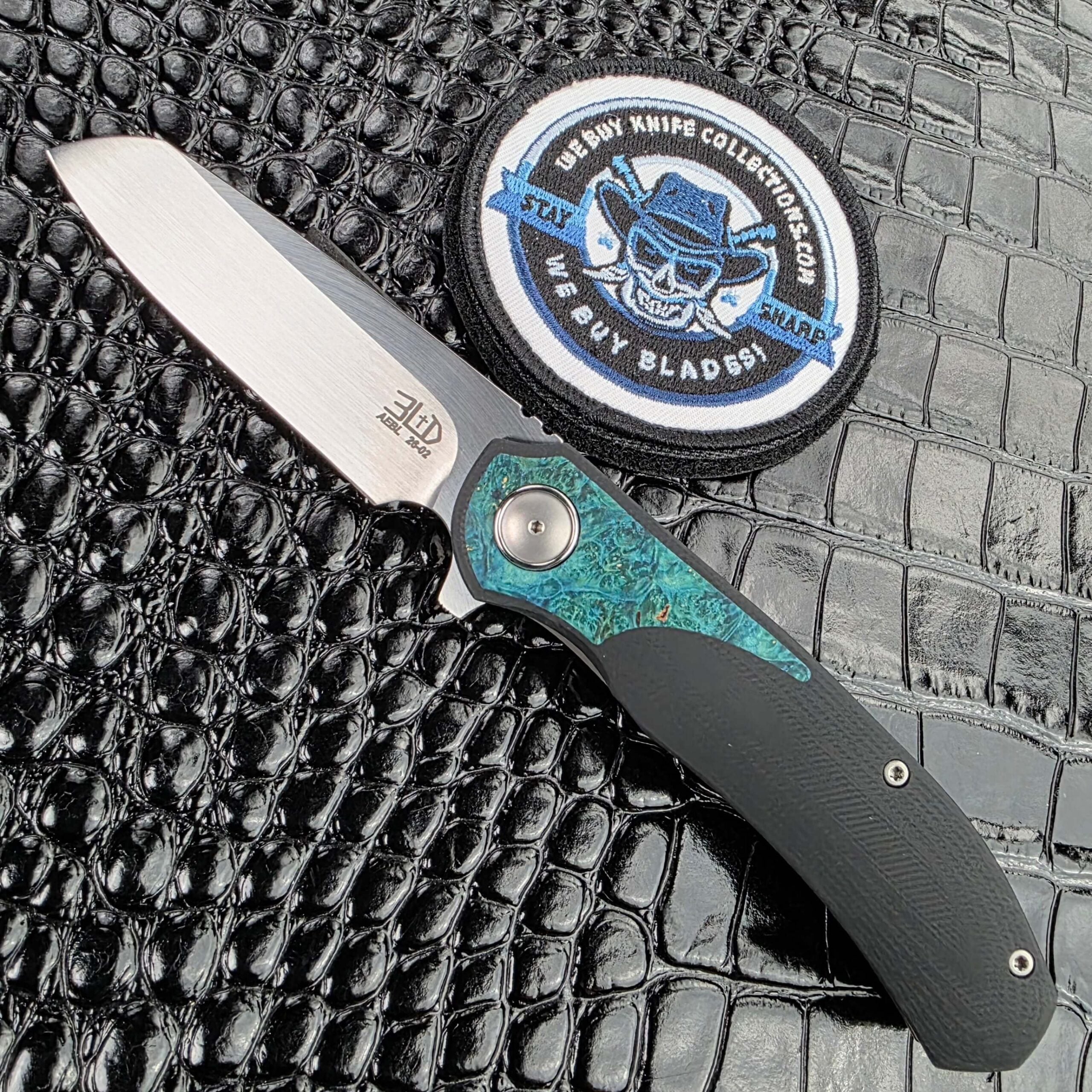 3LegDog Knives M10 #26-02 — Teal Stabilized Burl and AEB-L at 62 HRC by Riaan Manser